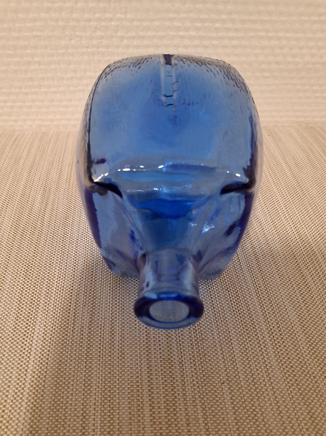 Blå sparegris i blå glas