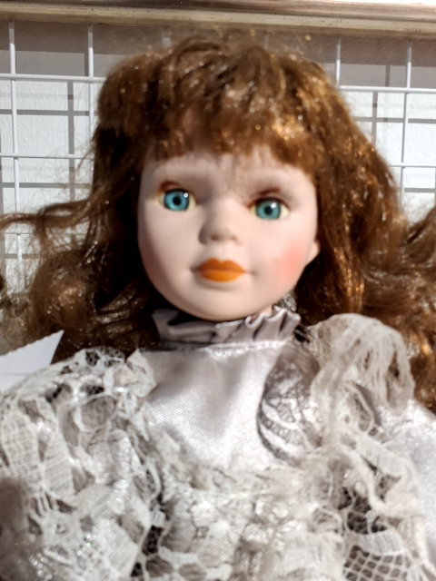 Porcelæns dukke