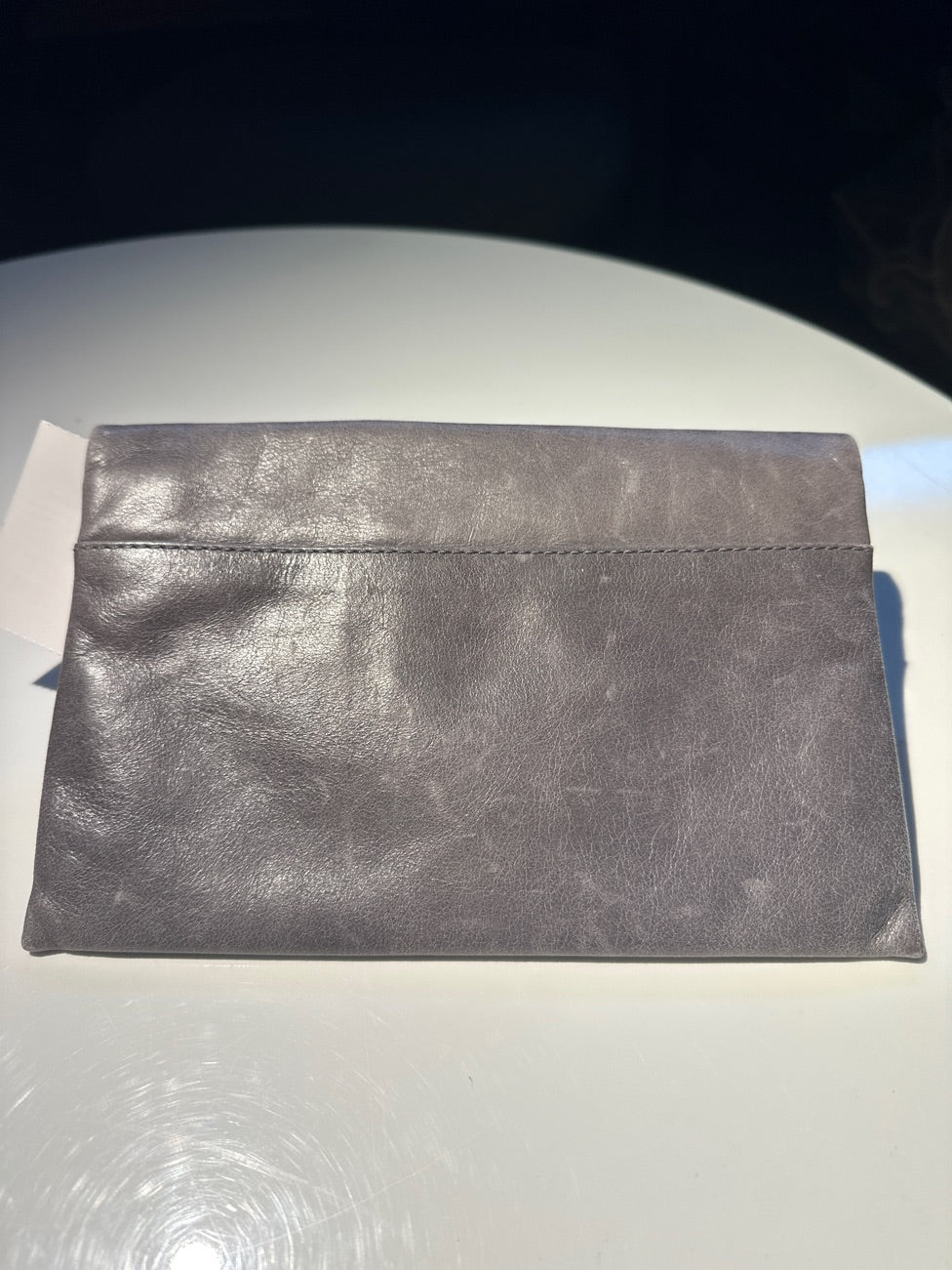 Belsac clutch