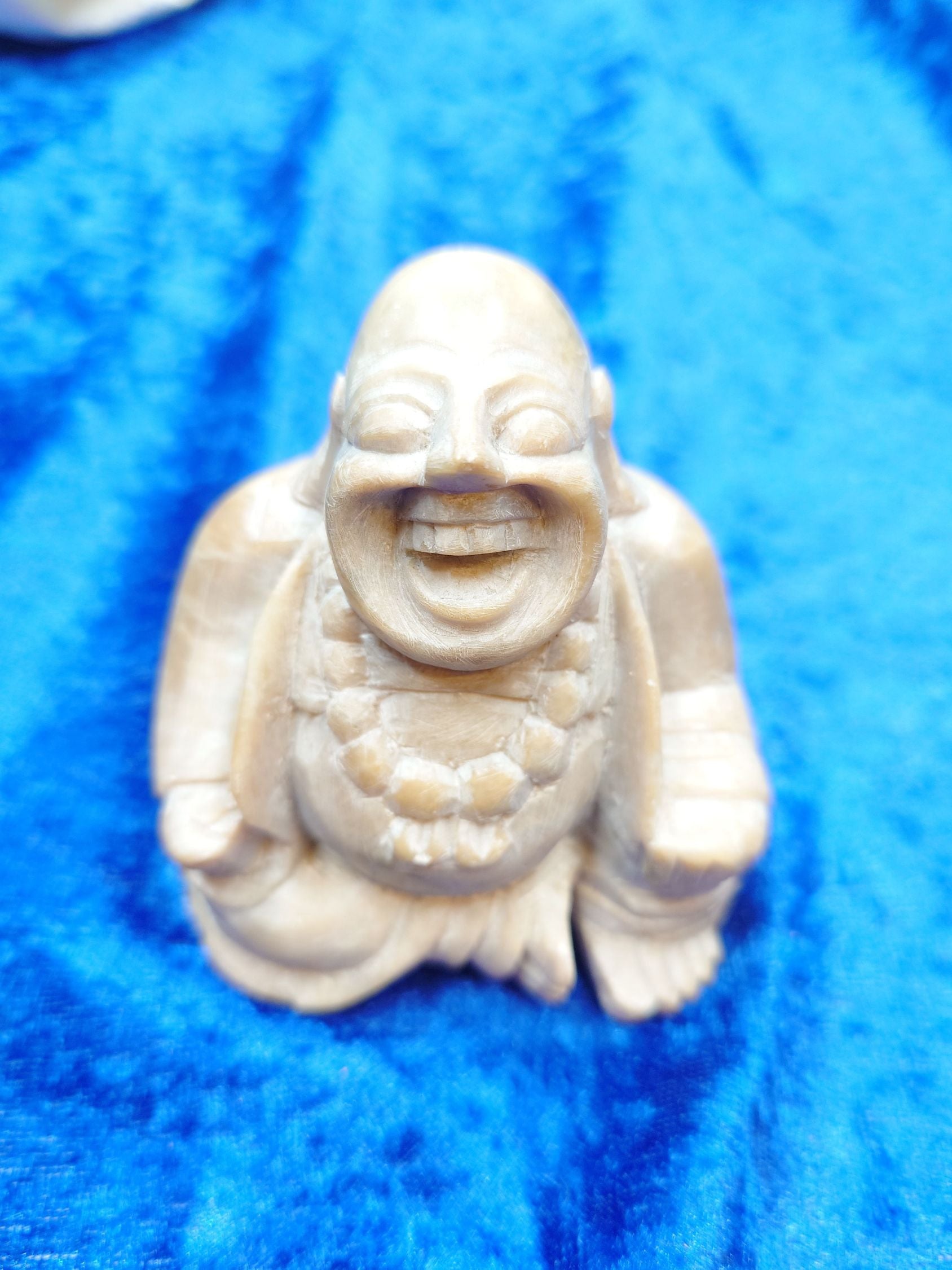 Smilende Budda