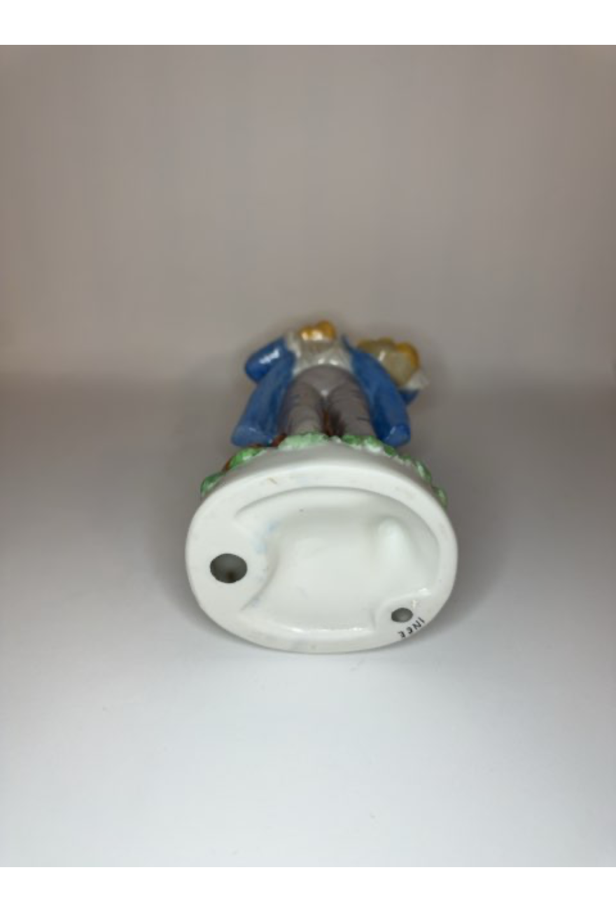 Porcelæn mand med frugter