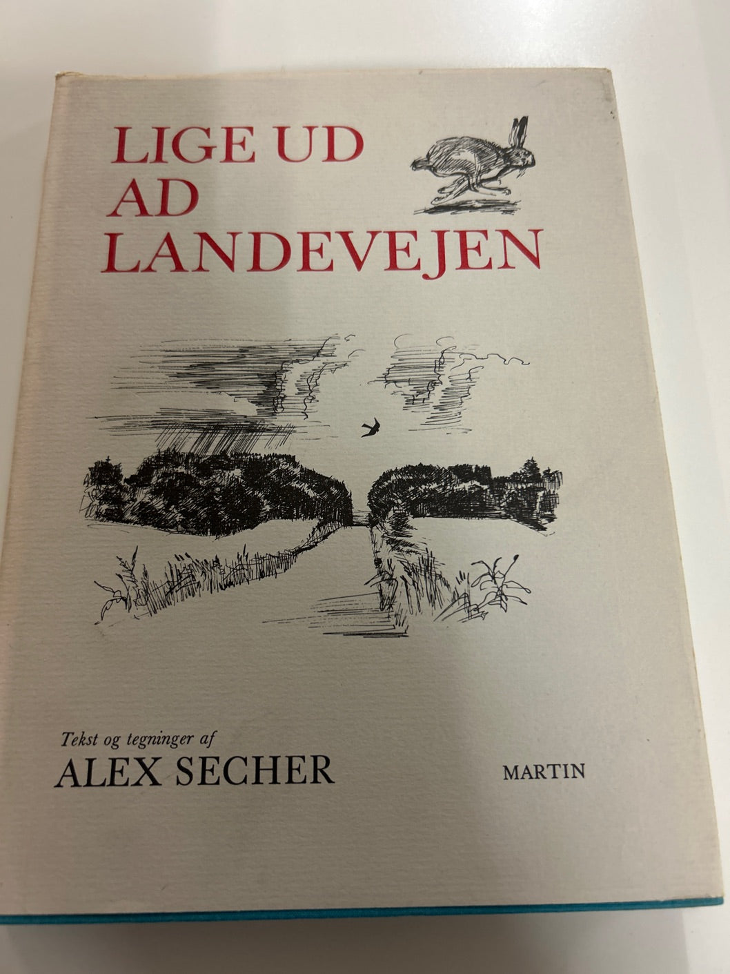 Lige ud af landevejen af Alex Secher