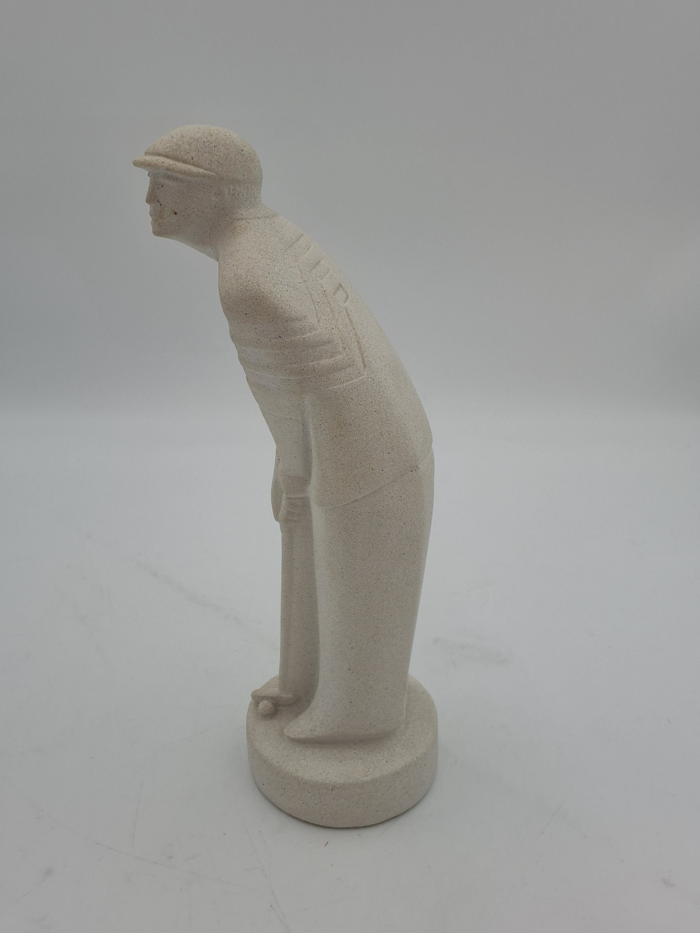 Golfspiller statue