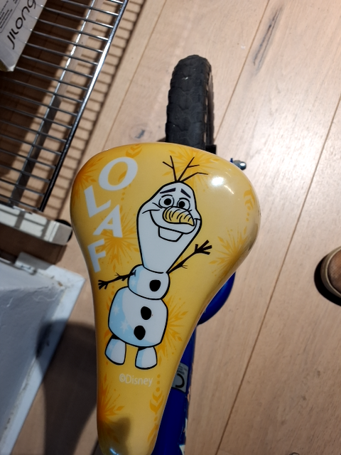 Blå løbecykel