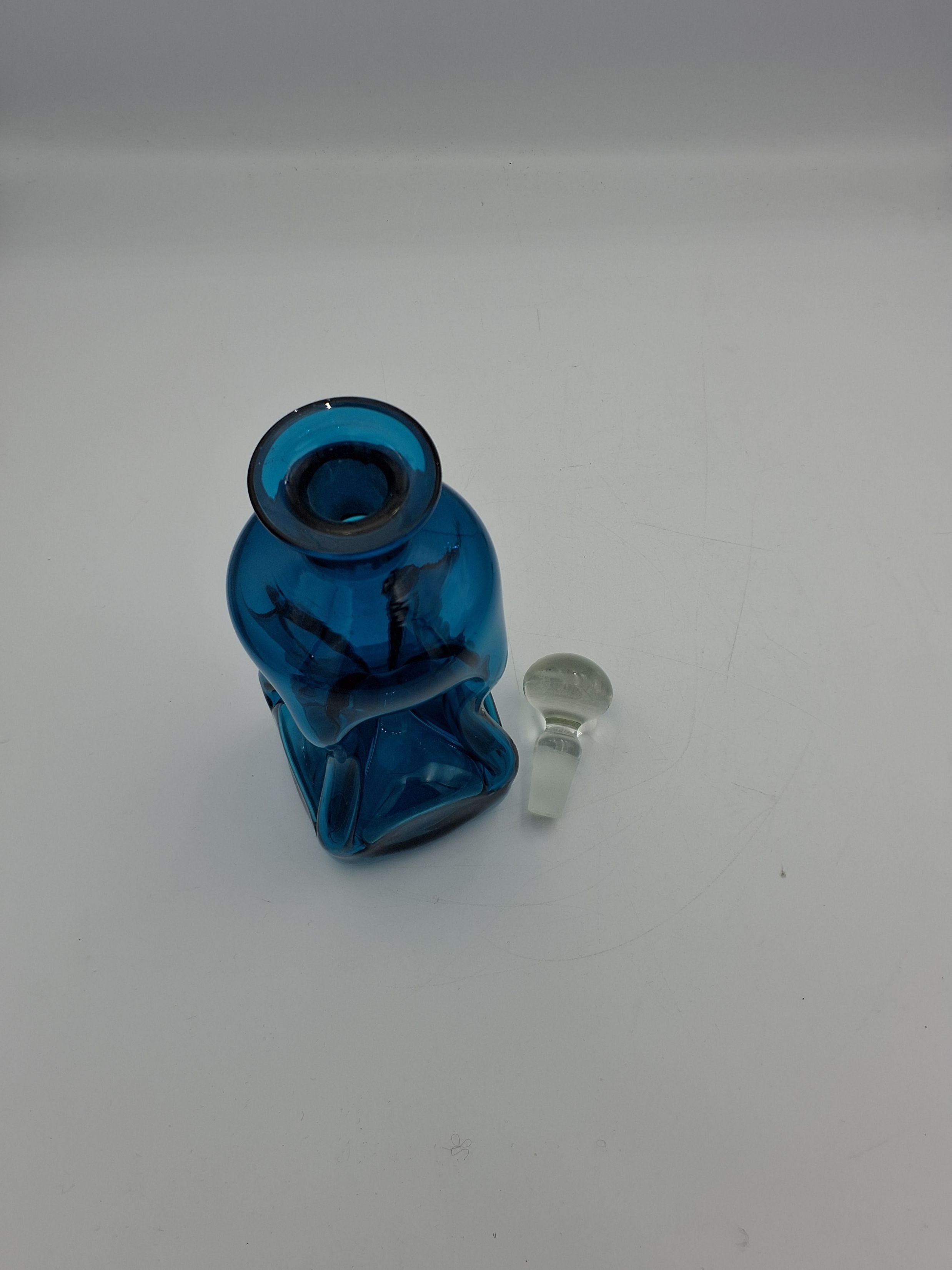 Blå klukfaske med prop