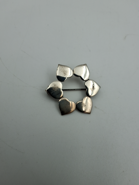 Rund Broche, Hans Hansen