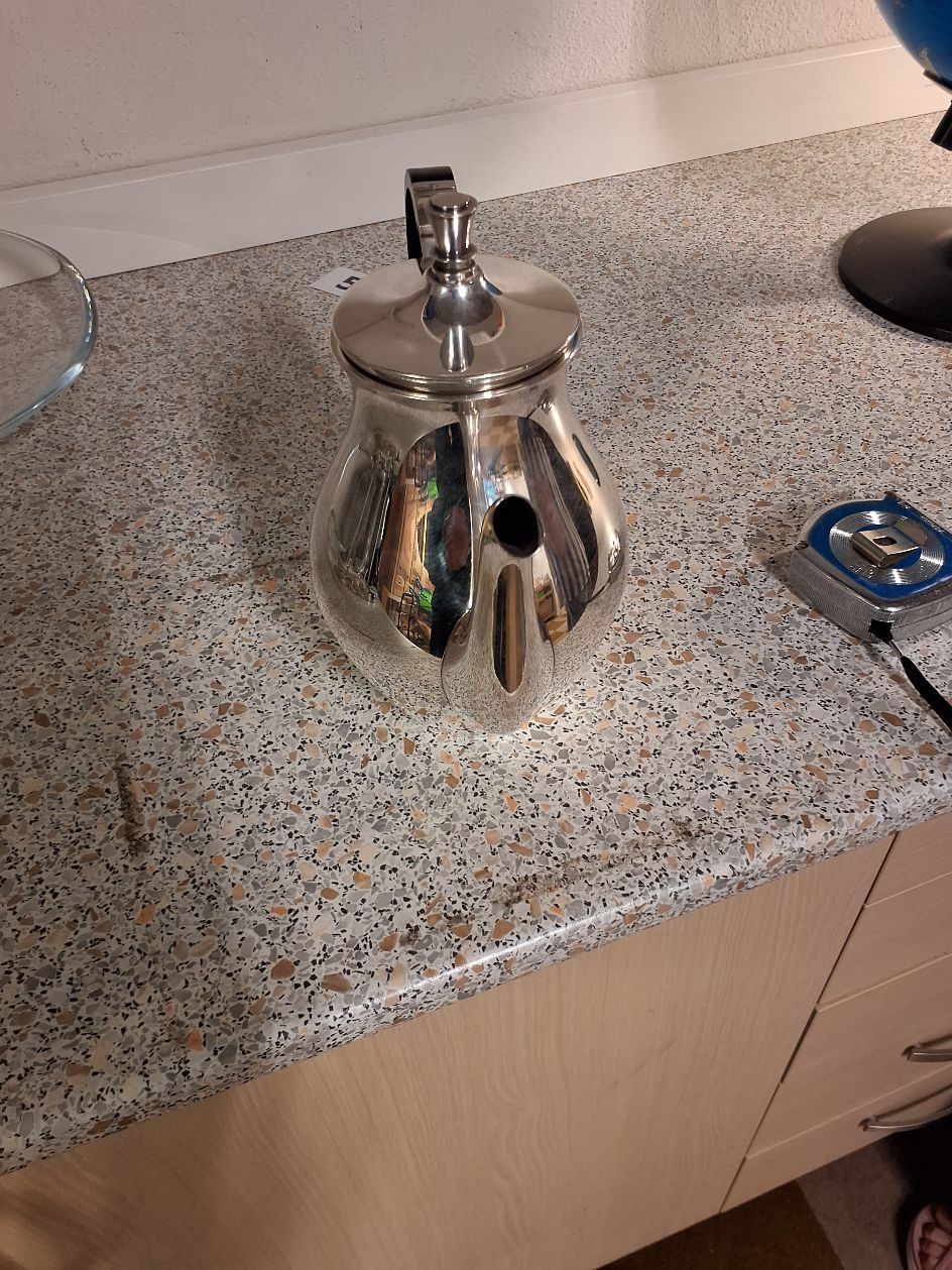 Sølvplet kande