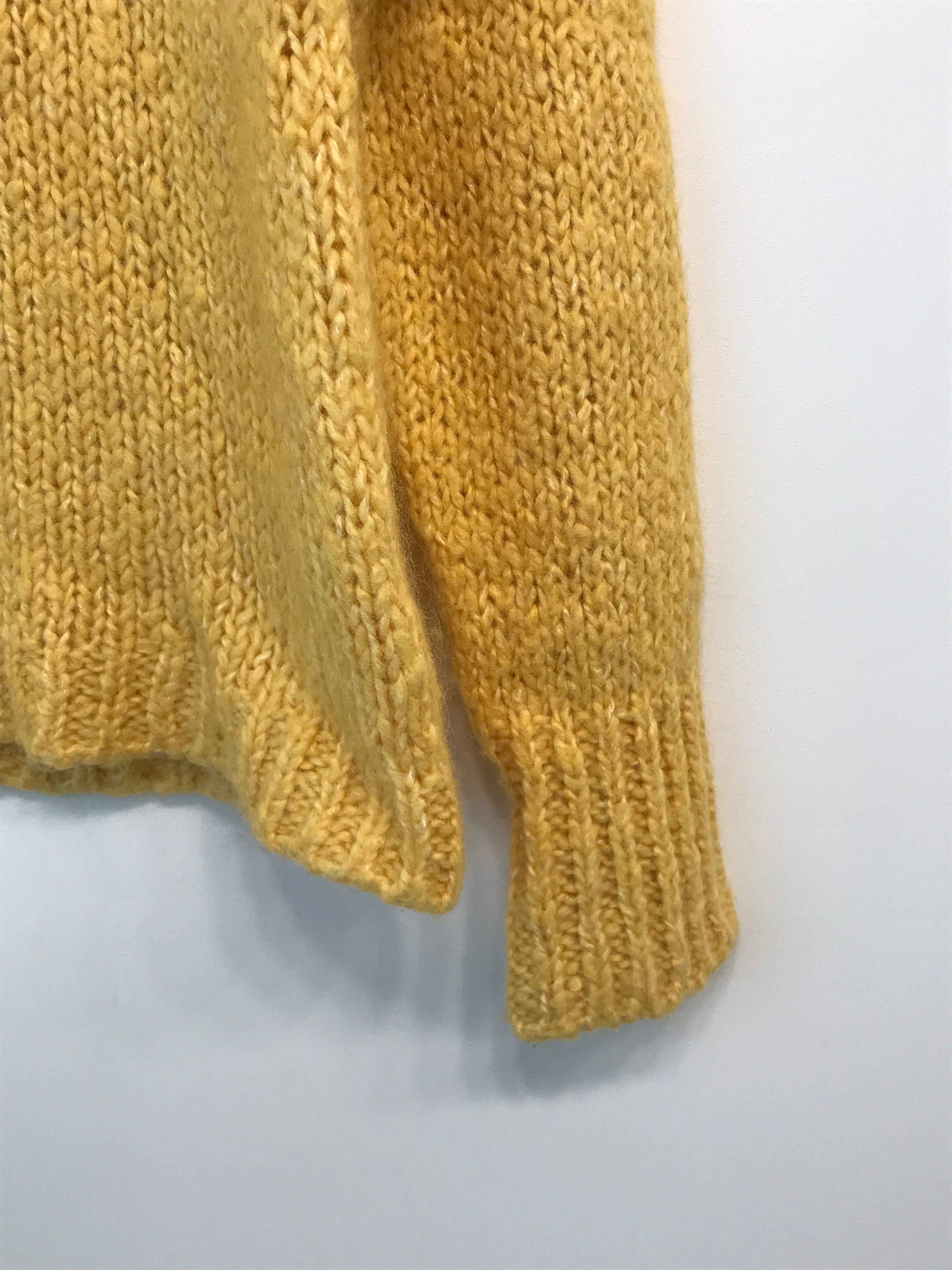 And Less Sweater