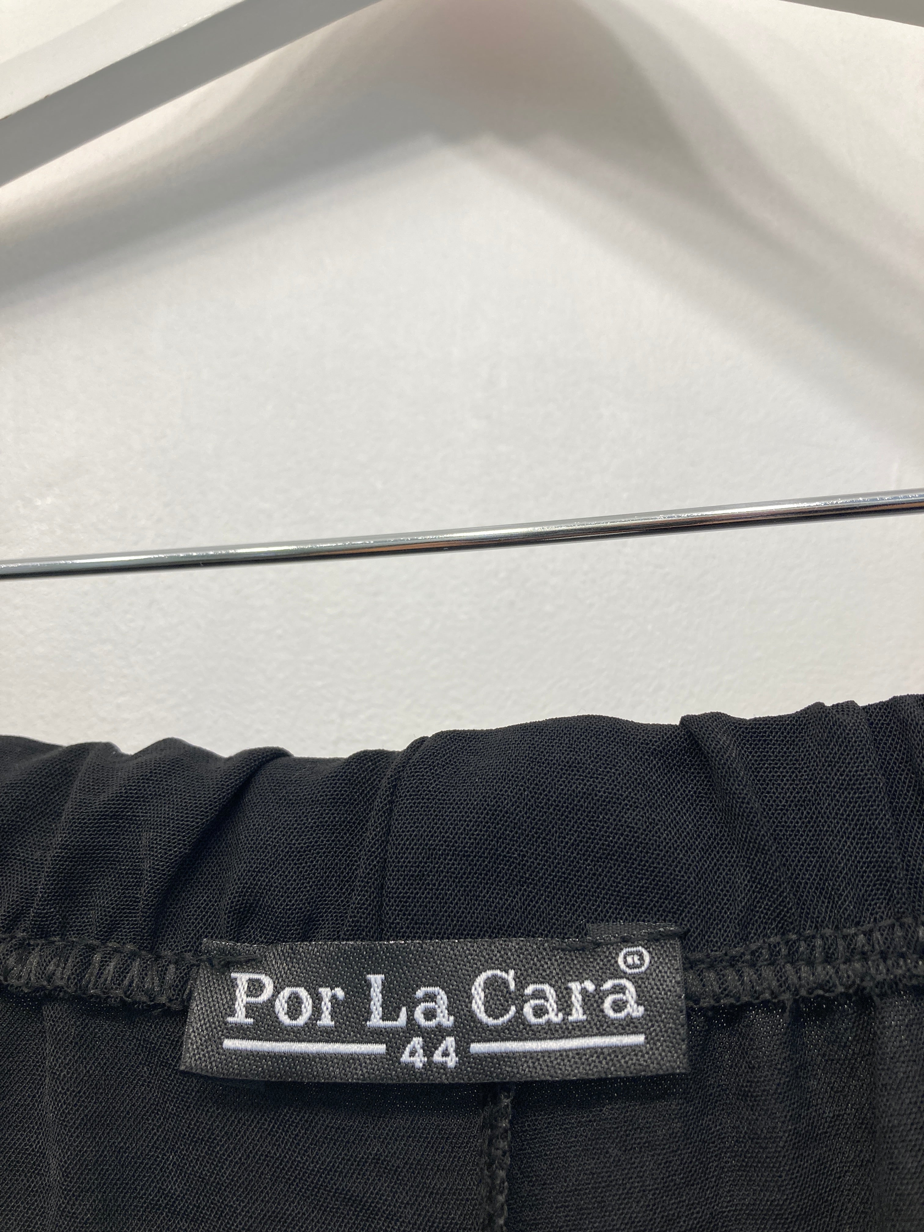 Por La Cara  Bukser