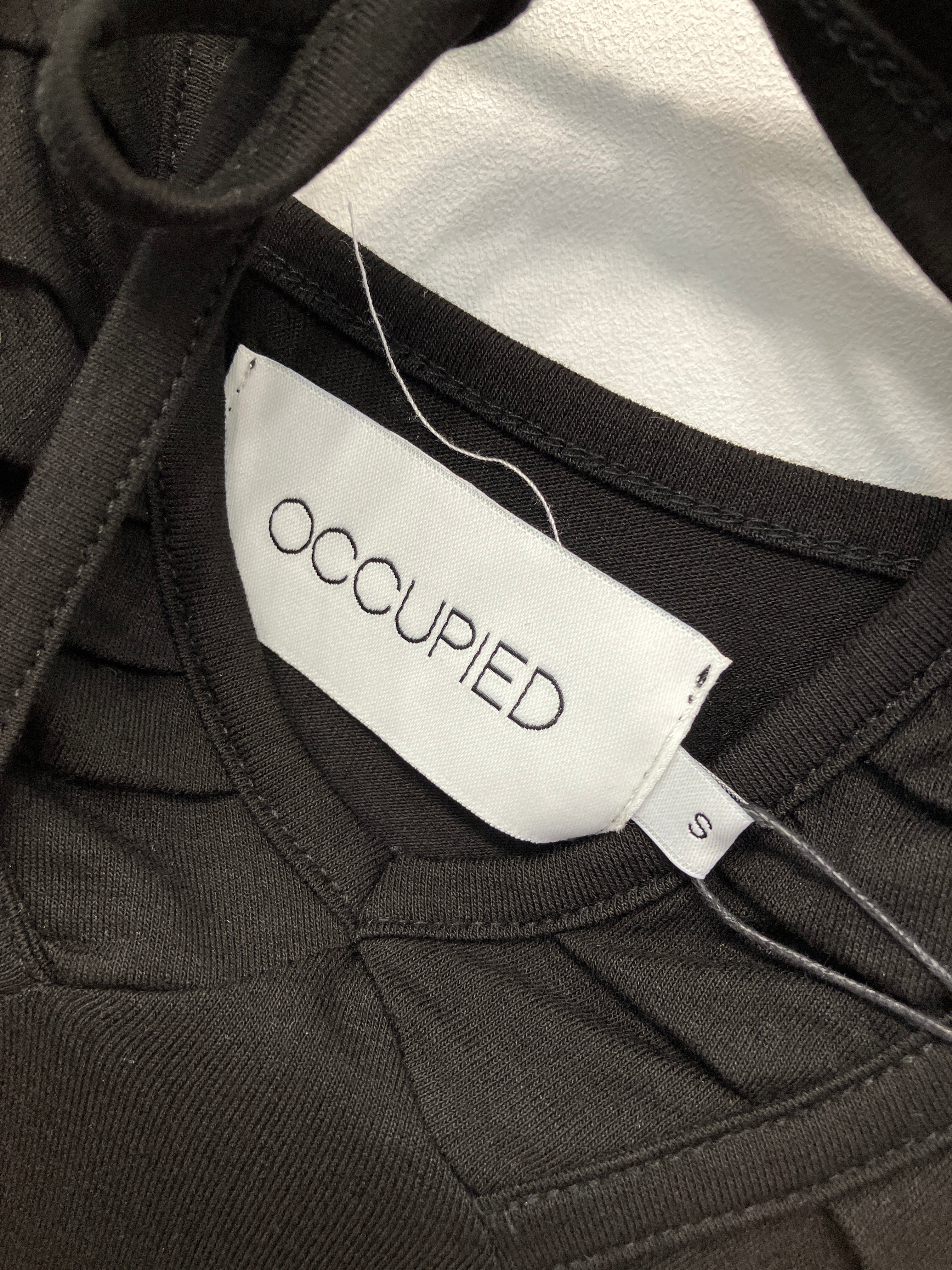 Occupied Top