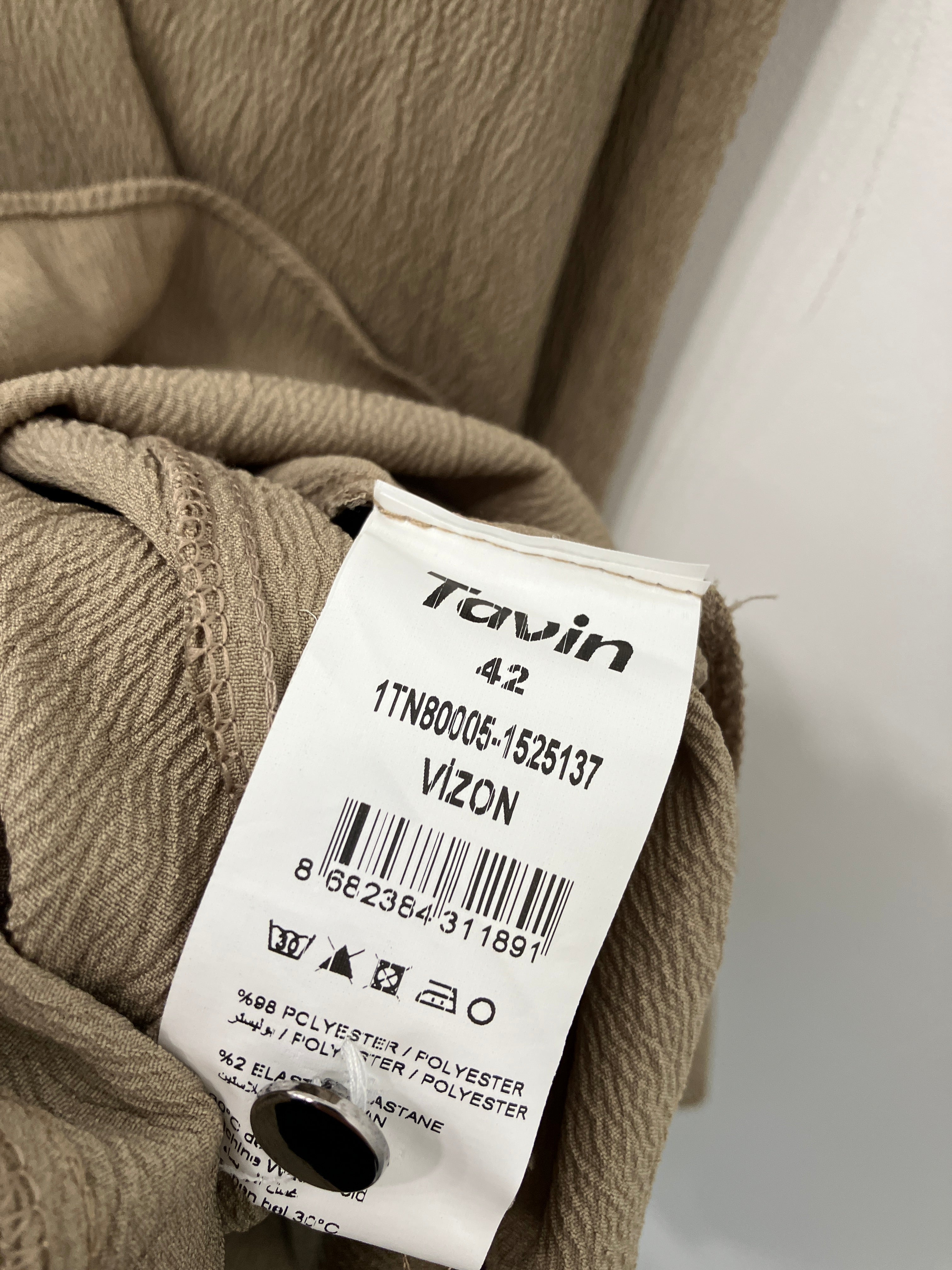 Tavin Kjole
