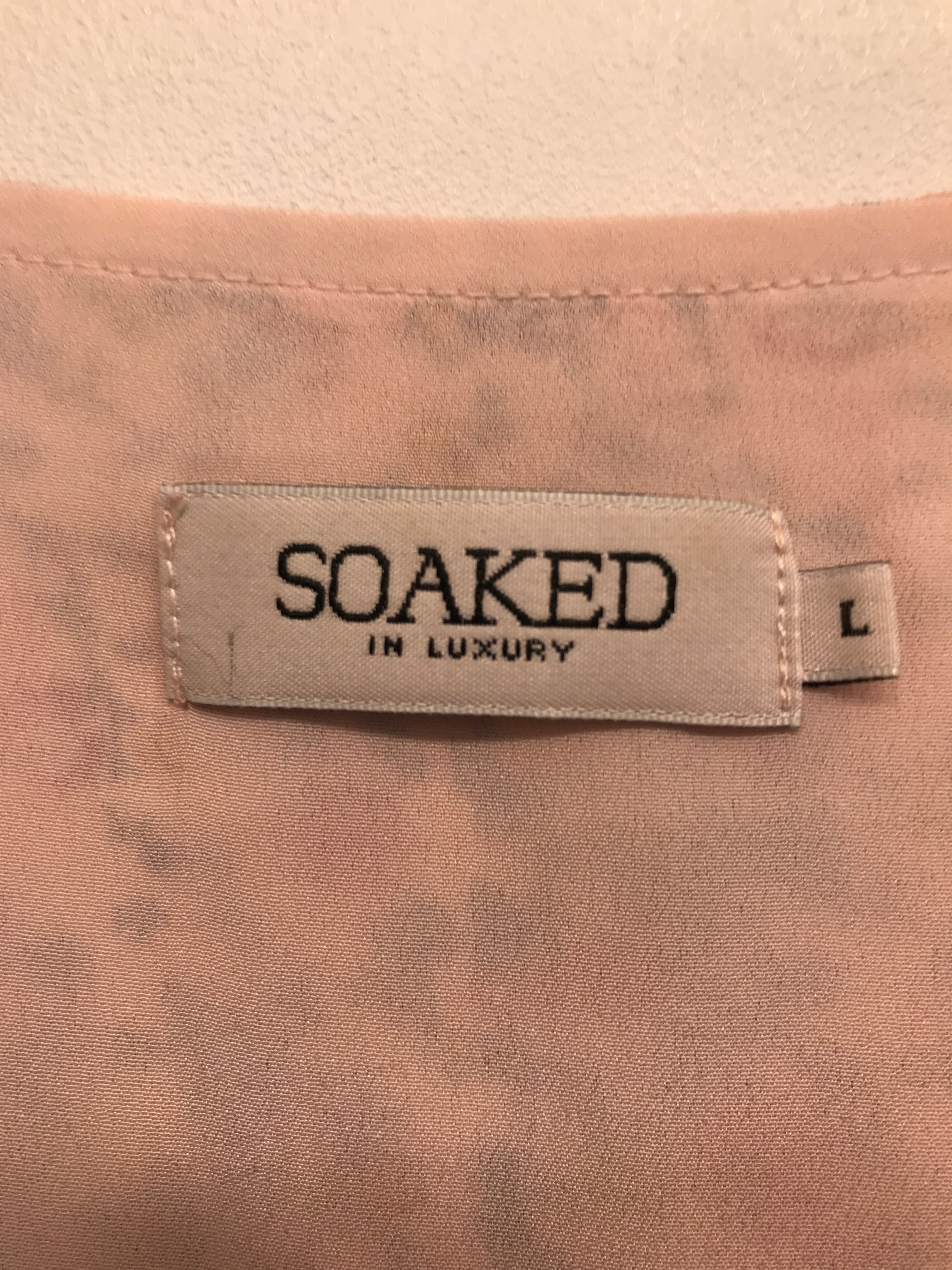 Soaked in Luxury top