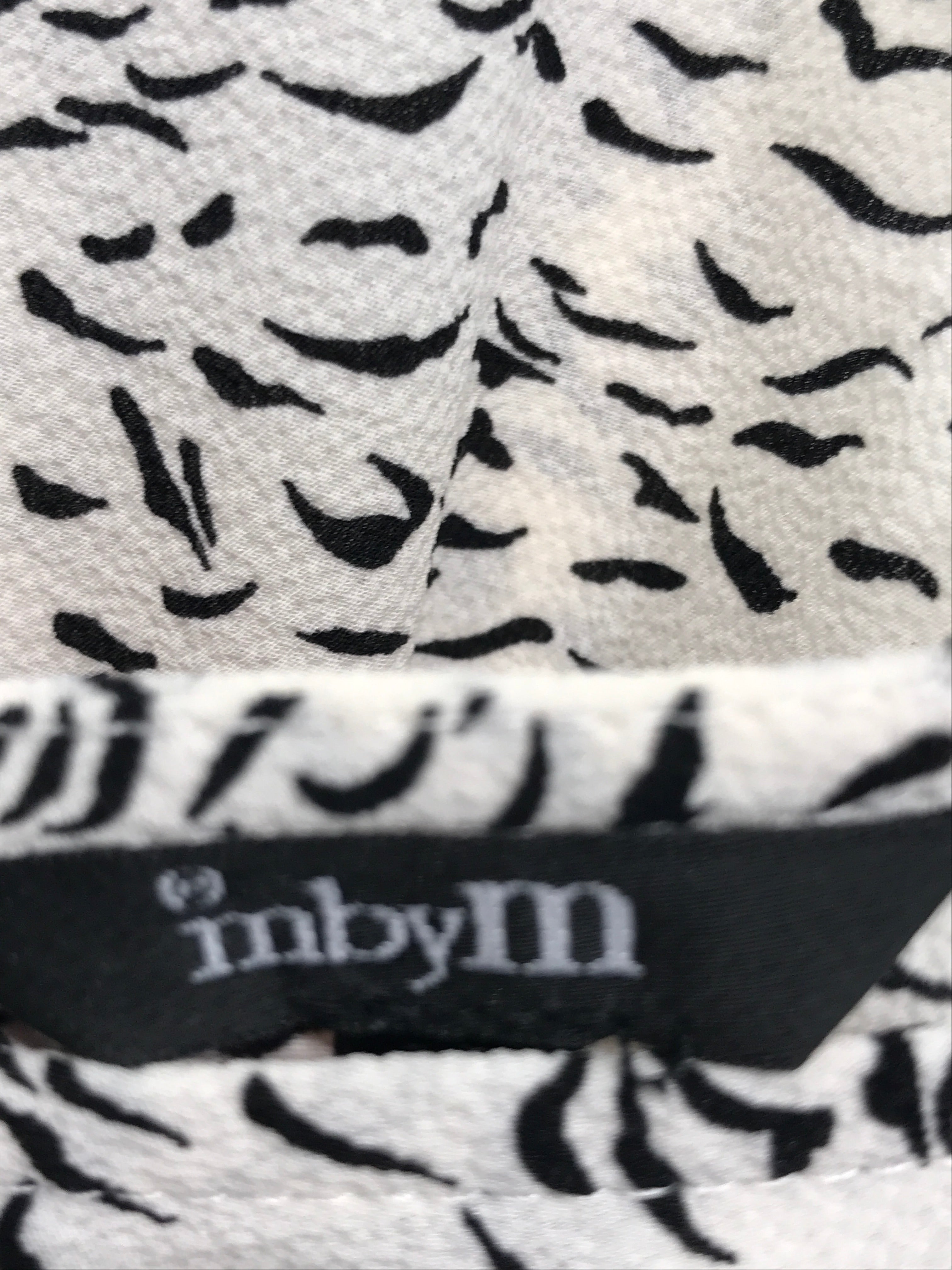 M by M Top