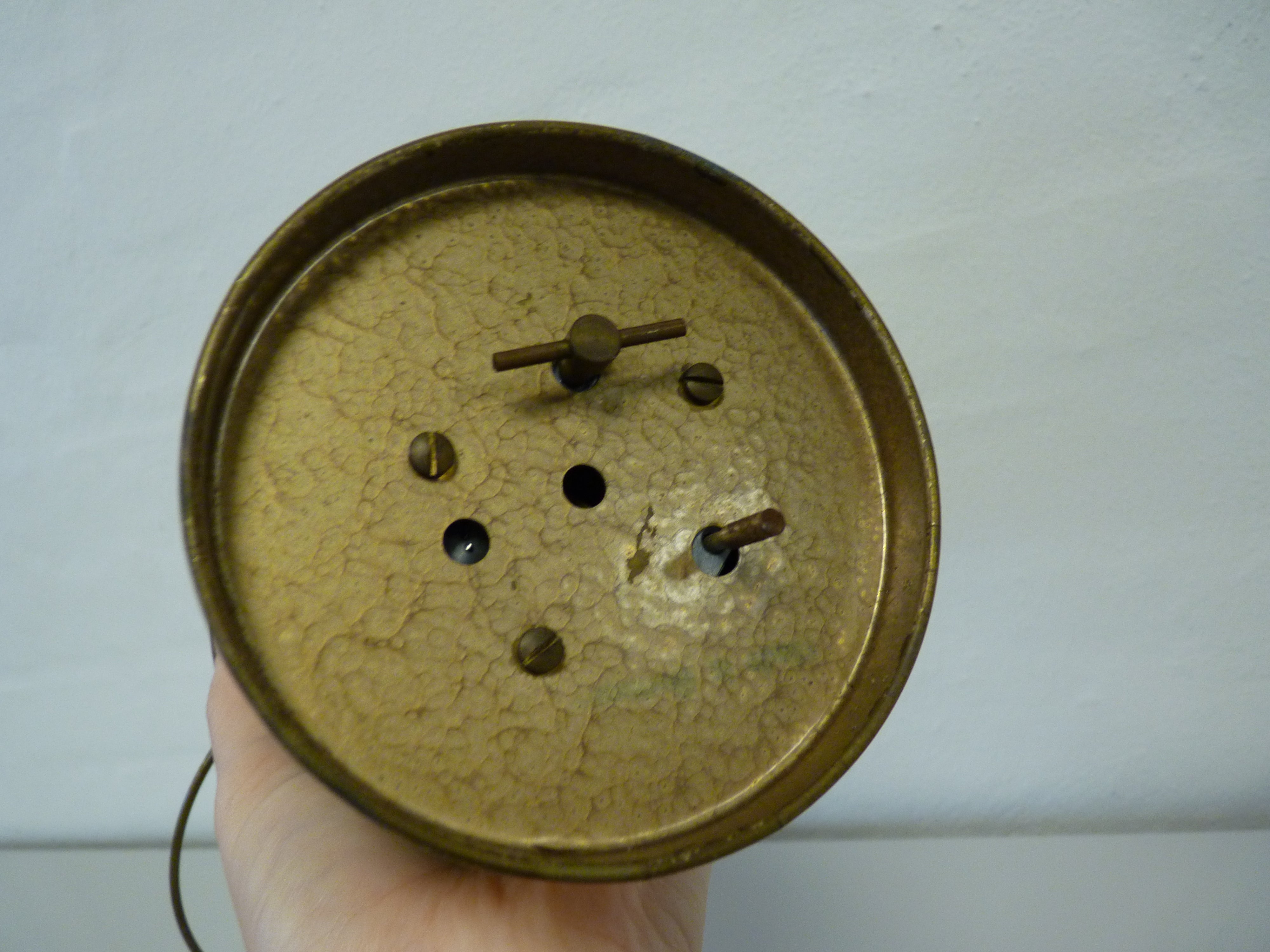 Snapseflaske i kobber beholder