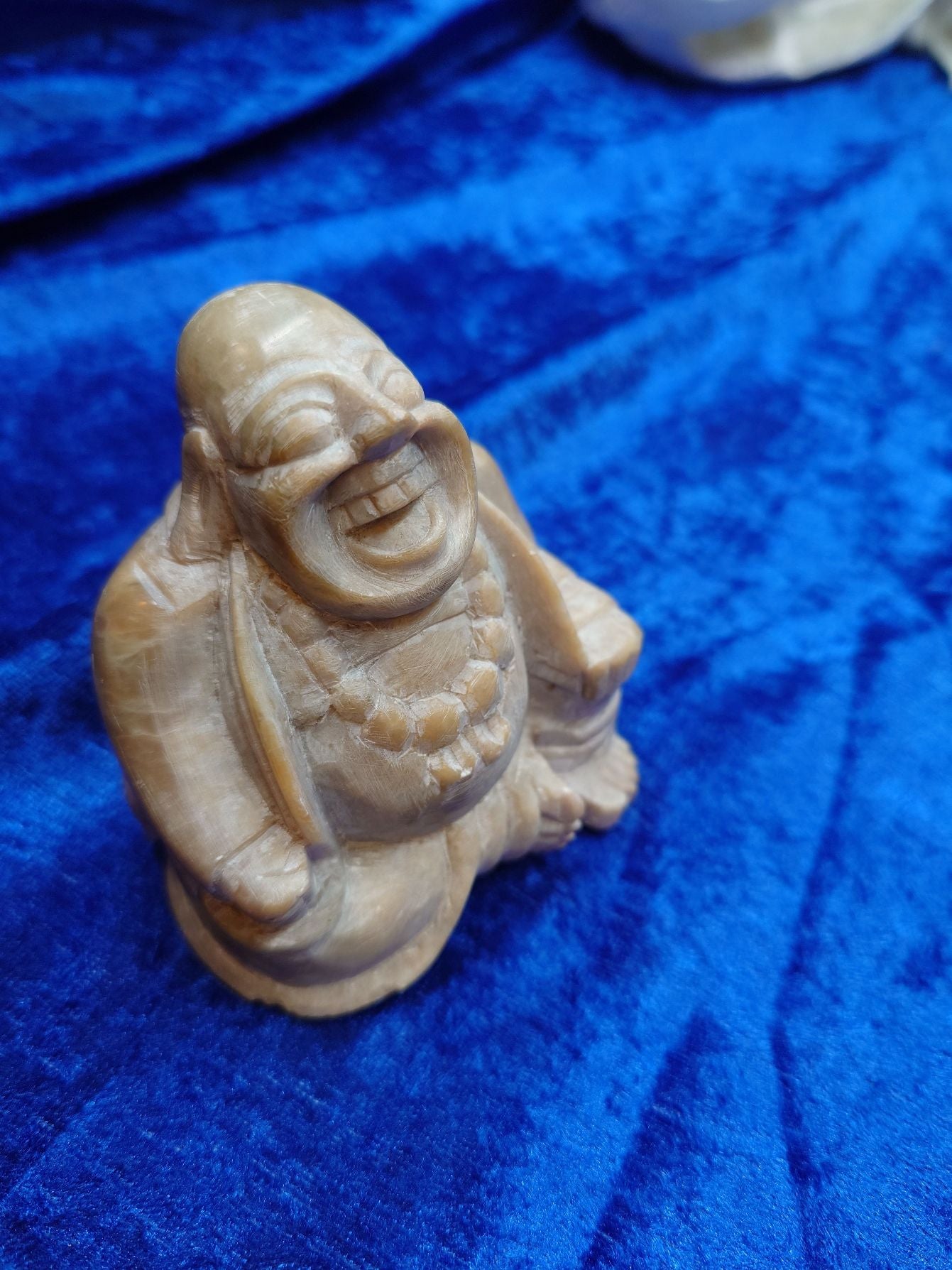Smilende Budda