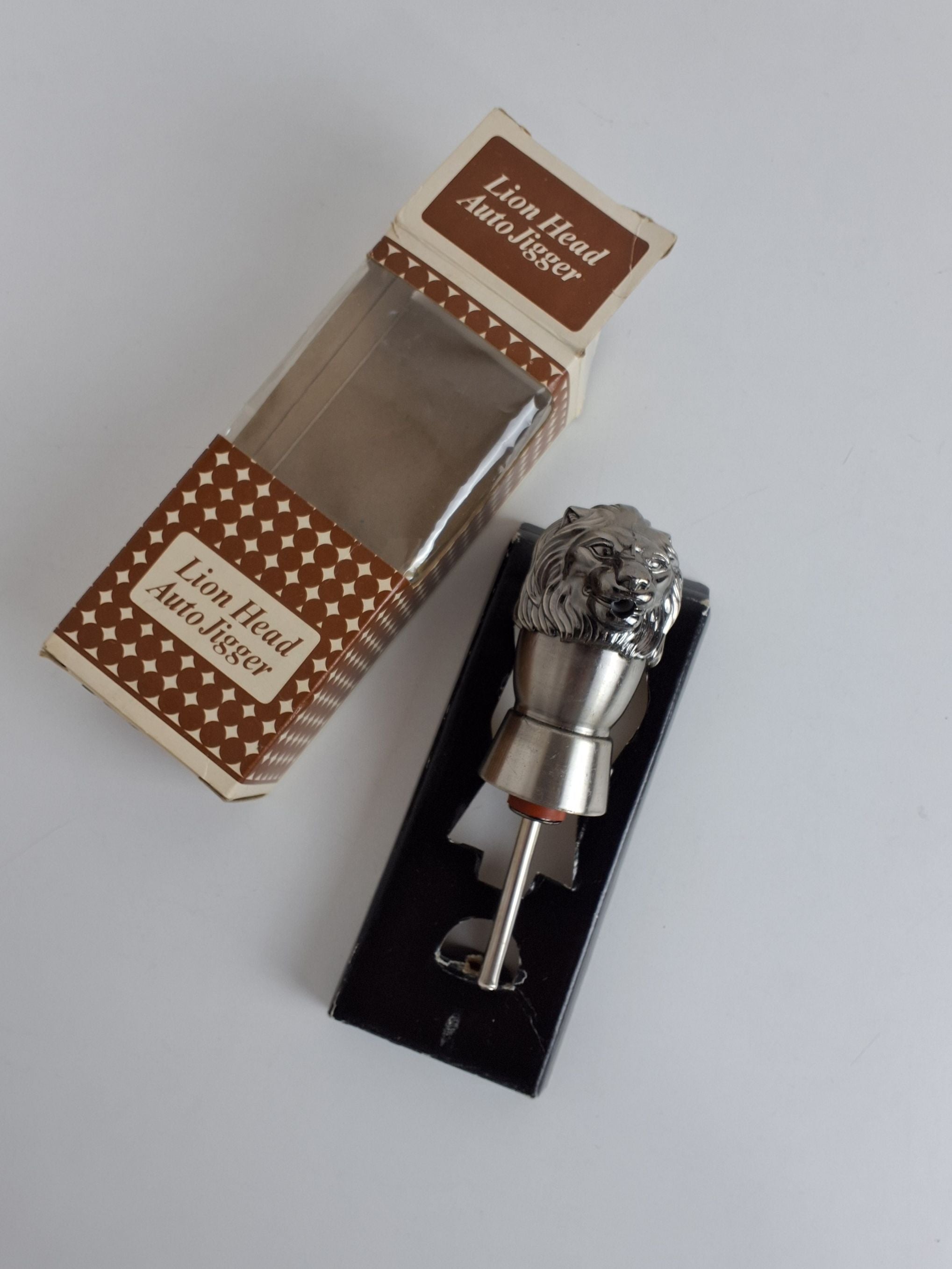 Antik vinprop, lion head auto jigger