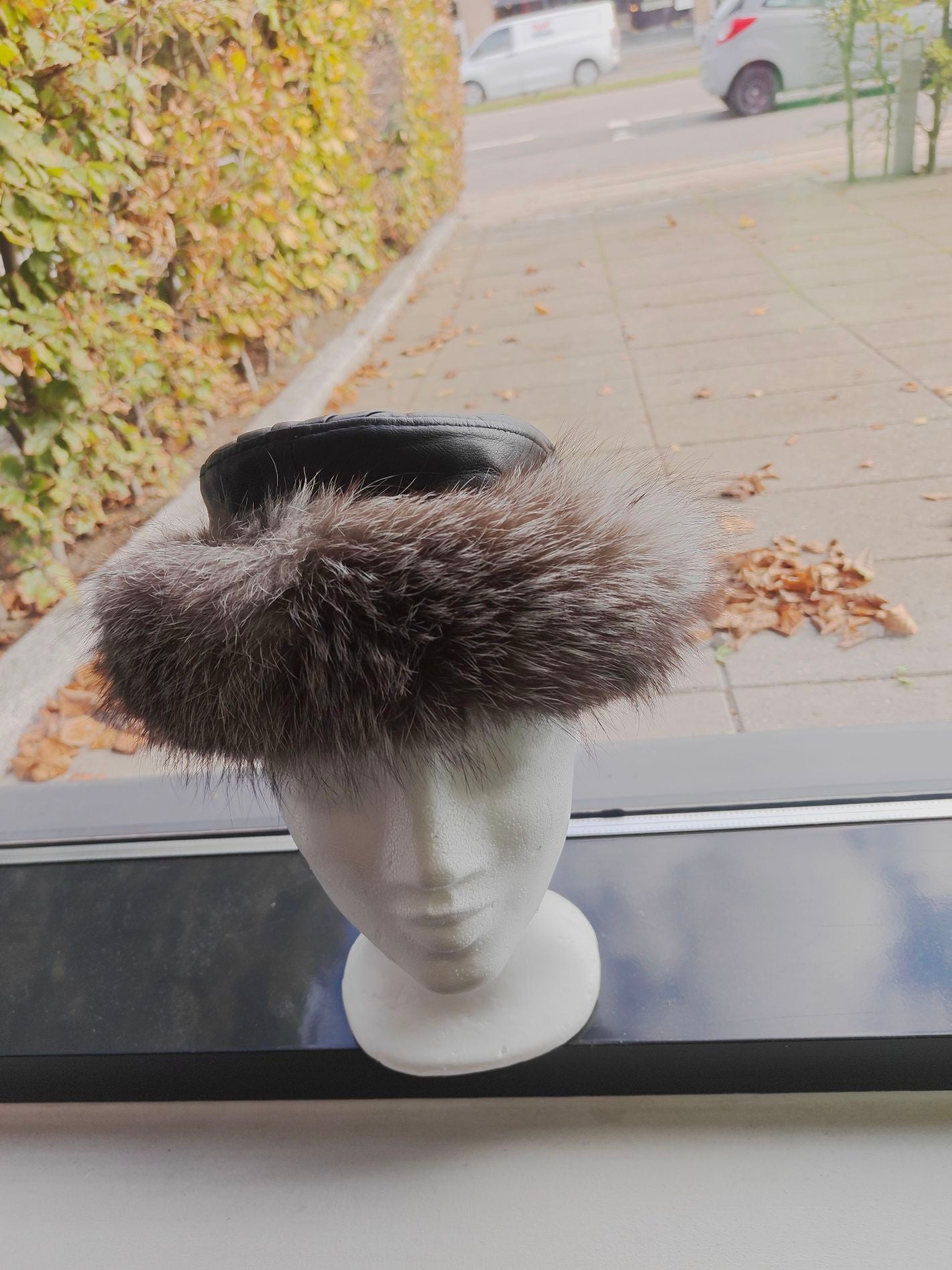 Hat, vaskebjørn og skind