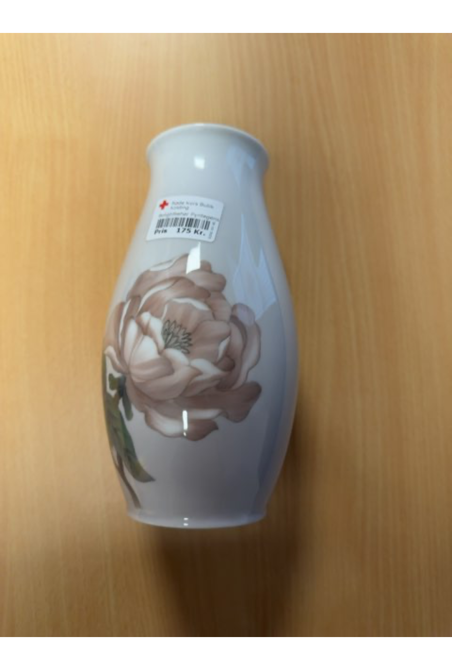Vase med blomst