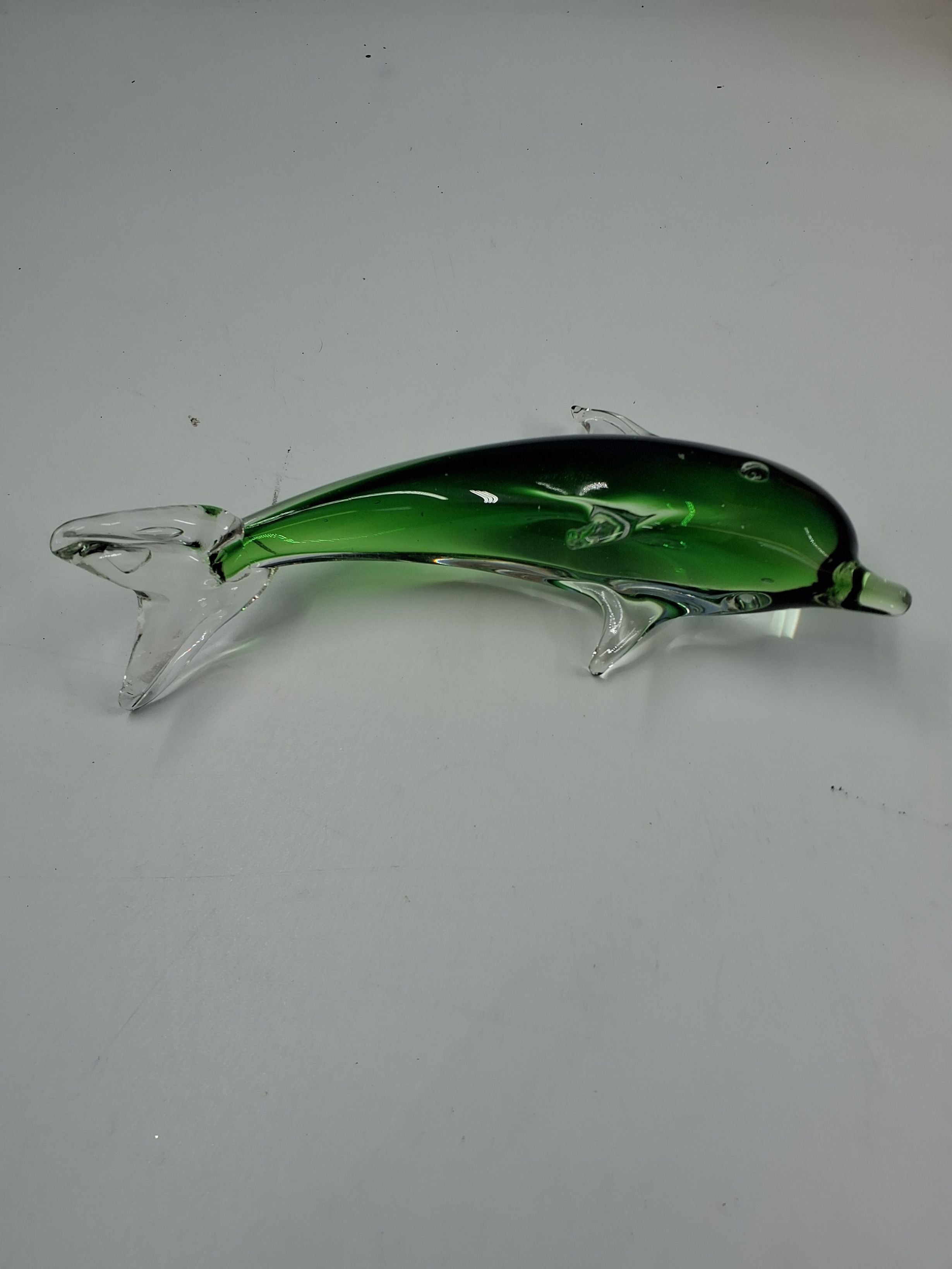 Glas delfin