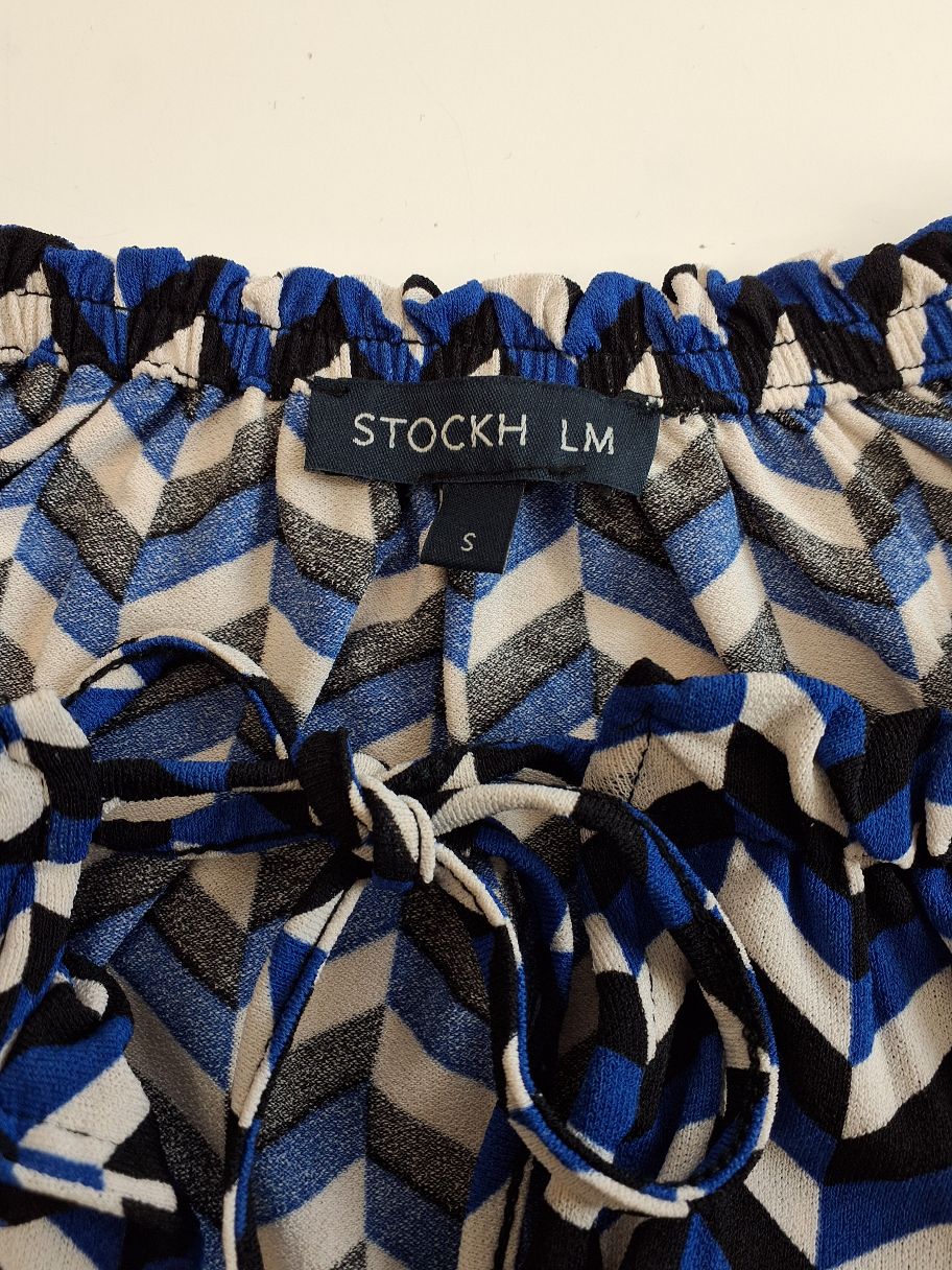 STOCKH LM Top