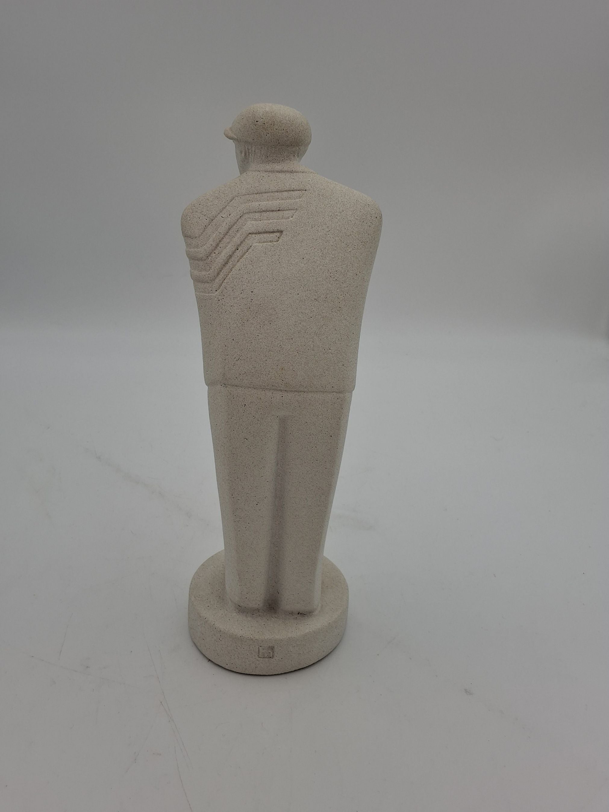 Golfspiller statue