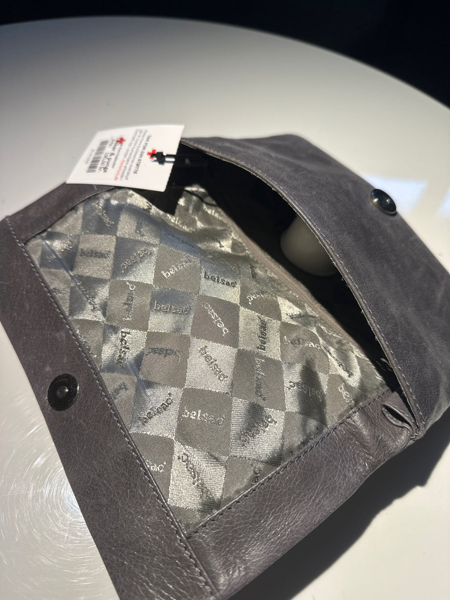 Belsac clutch