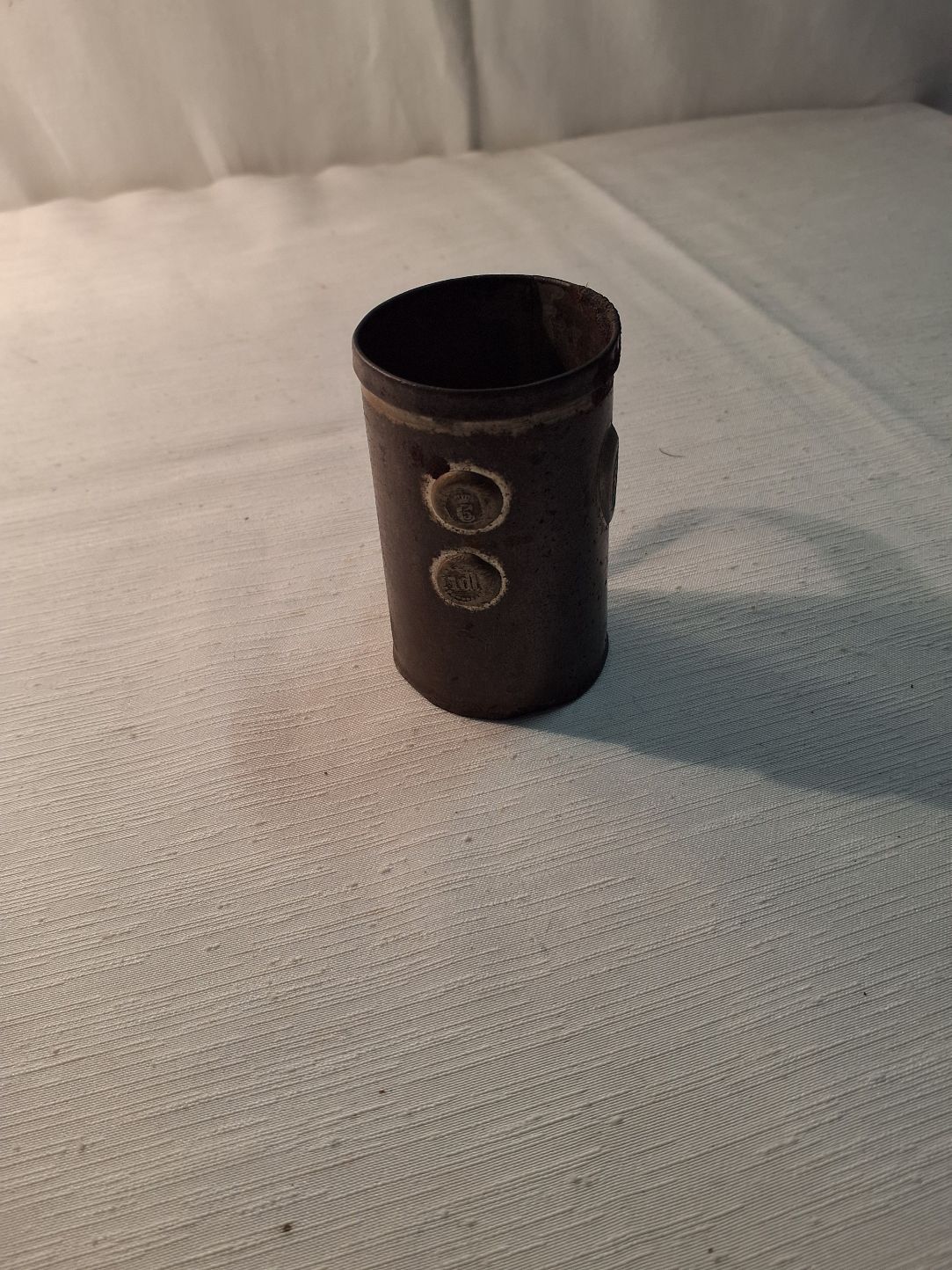 Tin målebæger