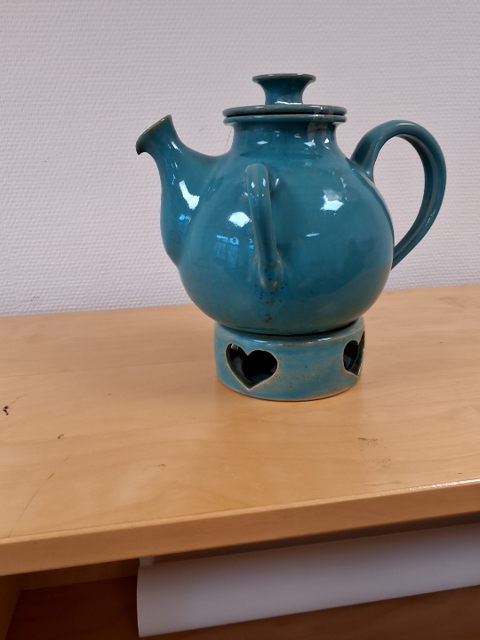 Tepotte med fyrfad