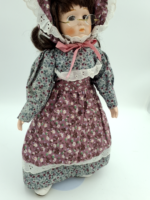 1. Porcelænsdukke m. Briller