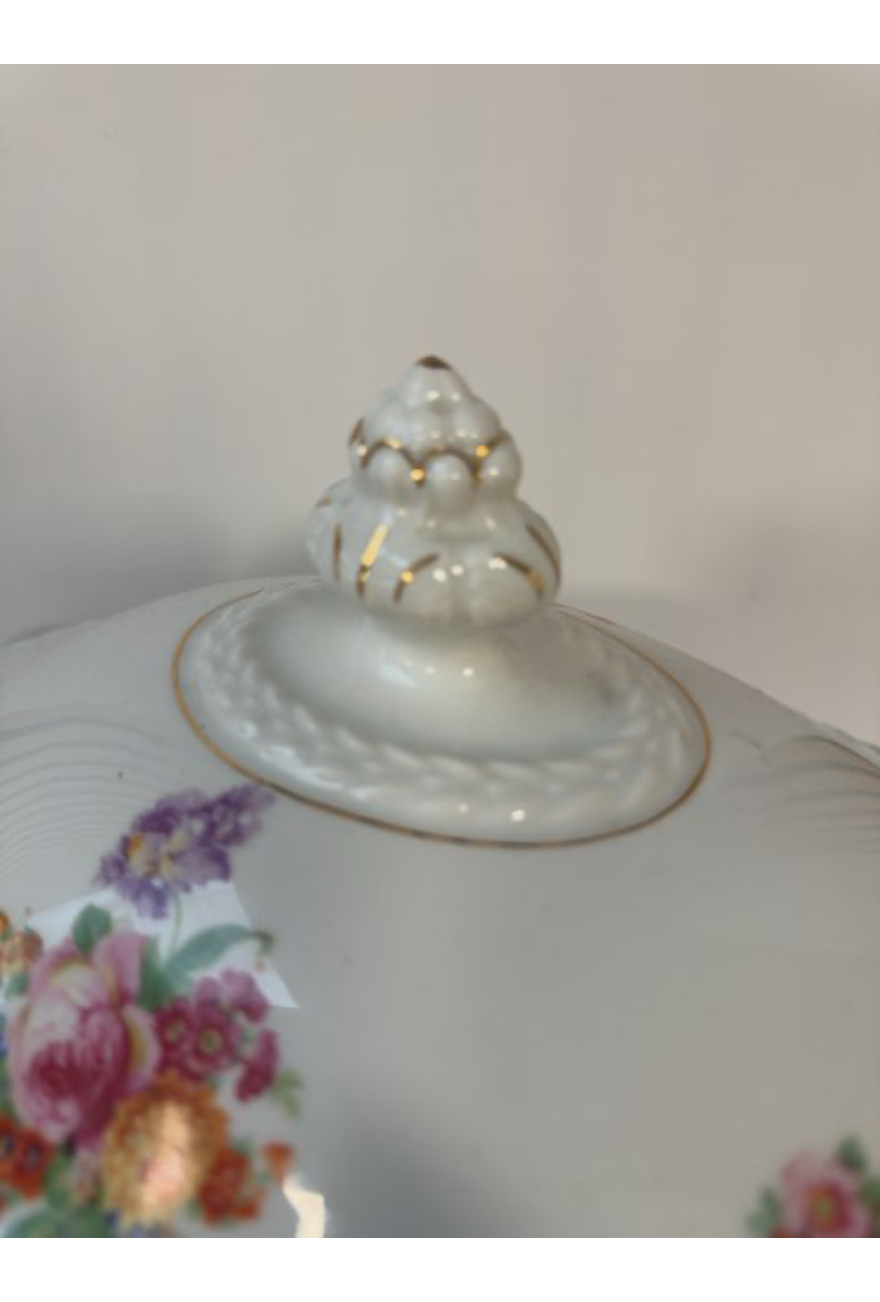 Suppeterin elegant med blomster og guld